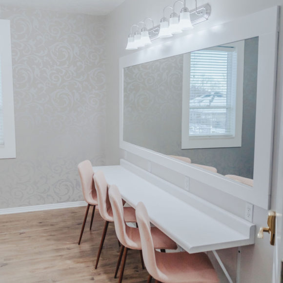 Bride and Bridesmaid room featuring a large mirror
